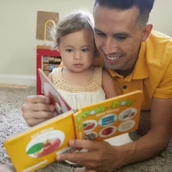 Poke-a-Dot: First Words Board Book