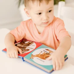 Poke-a-Dot: Wild Animal Families Board Book
