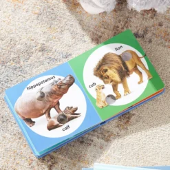 Poke-a-Dot: Wild Animal Families Board Book